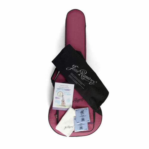 maroon guitar case pack with strings on top
